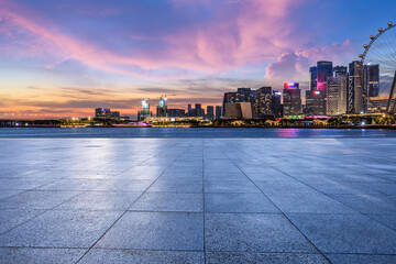 Wall Mural - Empty square floor with modern city buildings scenery at night. car advertising background.