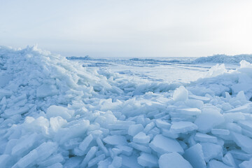 Wall Mural - Landscape with ice hummocks and snow on frozen Baltic Sea