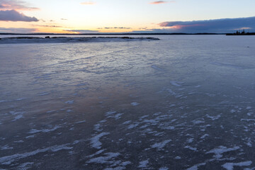 Wall Mural - winter landscape with ice covering frozen baltic sea. natural photo