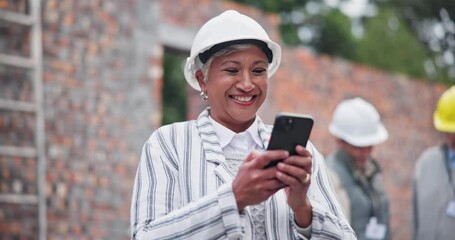 Canvas Print - Woman, architect and phone at construction site for smile, text or approval from city board for expansion. Contractor, person and happy on smartphone with notification for deal for building material