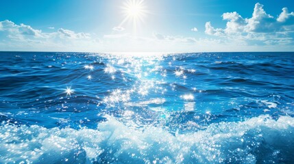 sun rays creating sparkles on blue ocean waves with horizon