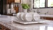 © AlfaSmart - Empty dish drying rack on marble countertop