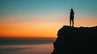 © cff999 - silhouette of a woman standing on the edge of a cliff at sunset