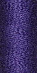 Wall Mural - macro texture of a skein of purple sewing thread