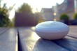 © Maksym - Close up of a portable speaker on a modern terrace, perfect for outdoor ambiance