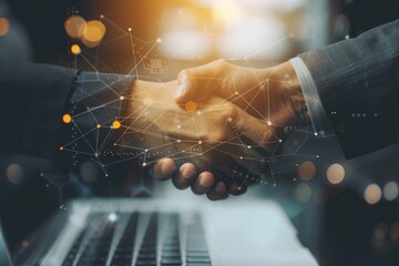 Poster - two people shaking hands over a laptop, Overlay a laptop with a handshake to craft a double exposure that represents technology-driven business partnerships and collaborations