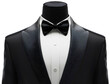 © Nemanja - Black tuxedo suit with bow tie and white shirt on a mannequin isolated on a transparent background. Luxury businessman or groom clothing fashion, wedding style, elegance wear, gentleman tailor