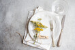 © ADDICTIVE STOCK - Rustic table setting with fresh meadow wildflowers and thank you note