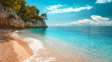 Wall Mural - A peaceful secluded beach with rocky cliffs and crystal clear blue water, evoking a sense of adventure, solitude, and natural wonder under a bright sunny sky.