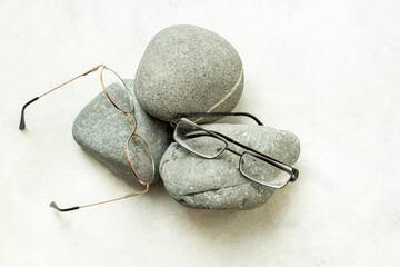 Wall Mural - Flat lay of eyeglasses with different lenses, top view. Eyes healthcare concept