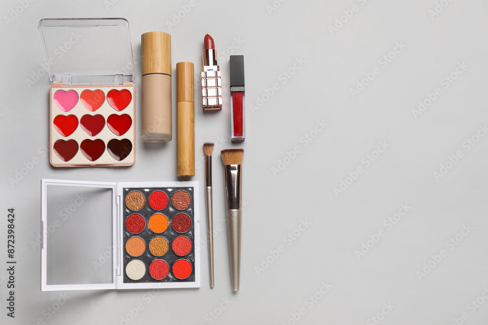 Set of cosmetic products on grey background. Top view