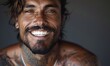© Stanislav - Man with tattoos and a mysterious smile