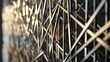© Salman - modular fence with thin metal rods arranged in a random, intersecting pattern, creating an abstract and dynamic visual barrier