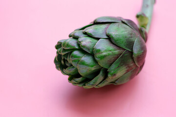 Sticker - Purple artichoke on pink background.