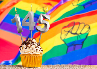 Birthday candle number 145 - Gay march flag background