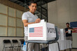 © Alan - hispanic man placing his vote ballot in the polling box in the us elections of usa, cituzen voting in united states of america