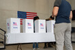 © Alan - people waiting in line queue for voting registration in the US election polling place