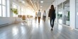 © Anastasiia - Blurred motion of business people in modern open office space. Concept Blurred motion, Business people, Modern office, Open space, Work environment