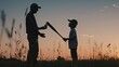 © Pihta - Silhouette photo of a father and son are playing baseball.