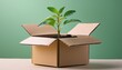 © Marko - Plant growing in a cardboard box on simple colored background with copy space