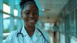 © siriporn - Young female african american medical student working at the hospital and medical staff, Happy woman doctor or nurse at hospital corridor, People and medicine concept dvertising style images