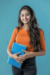 © Neha - happy girl student holding books