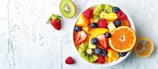 Poster - Fresh fruit salad in the bowl. Copy space image. Place for adding text or design
