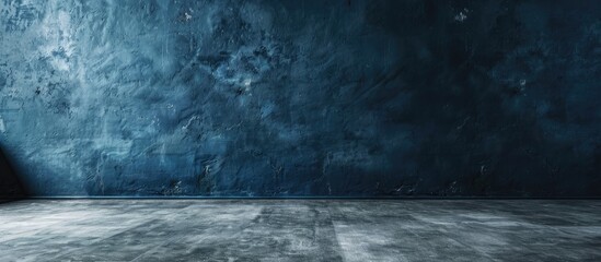 Canvas Print - Studio with a dark blue wall as backdrop and cement floor designed for showcasing products and text with copy space image on concrete background.