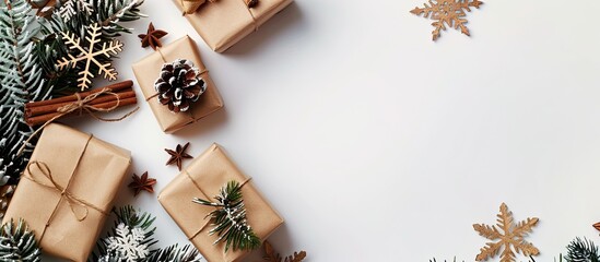 Aufkleber - Winter holiday concept with Christmas gifts, wooden snowflakes, and fir branches on a white backdrop, perfect for a copy space image.
