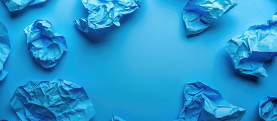 Aufkleber - Blue crumpled paper with copy space image.