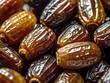 © Rafli - dates close up. date palm background. Date palm on a traditional craftsman market.Horizontal image.