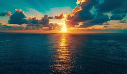 Wall Mural - beautiful sunset over the ocean with a blue sky, scenic view, calm seawater, drone aerial shot