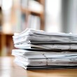 © zz - Stack of Papers on Wooden Table
