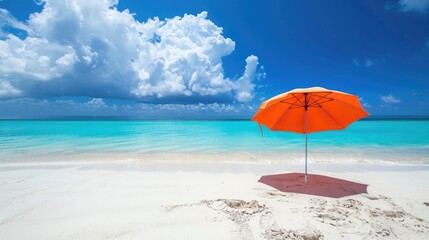 Poster - Sandy beach with white sand blue sky and umbrella