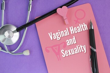 stethoscope and a pink sign with the words Vaginal health and sexuality