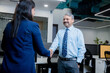 © GAJENDRRA BHATI  - indian professional woman handshaking, greeting client in office. Executive making successful deal with partner at workplace. corporate and business concept.