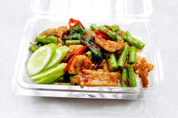 Wall Mural - Rice topped with stir fried pork and red curry paste with yard-long bean