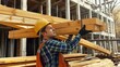 © LifeMedia - A construction worker in safety gear carries heavy wooden beams on a building site, focusing on the task at hand, symbolizing hard work and physical labor.