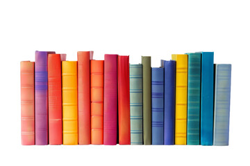 A row of colorful books lined up on a white background