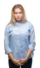 Poster - Young caucasian business woman over isolated background with serious expression on face. Simple and natural looking at the camera.