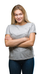 Poster - Young caucasian woman over isolated background happy face smiling with crossed arms looking at the camera. Positive person.