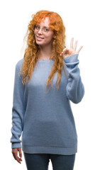 Sticker - Young redhead woman wearing glasses doing ok sign with fingers, excellent symbol