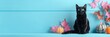 © Мария Фадеева - Black cat with pumpkins and pink autumn leaves on turquoise background for Halloween theme. Halloween background.
