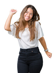 Canvas Print - Young beautiful brunette business woman over isolated background Dancing happy and cheerful, smiling moving casual and confident listening to music