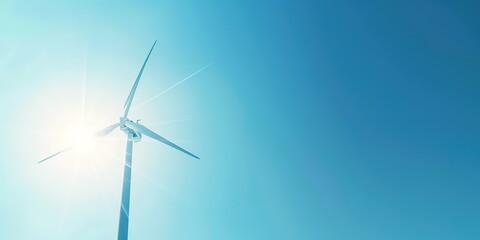 Sunlit wind turbine against clear blue sky, sustainable energy c