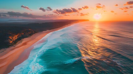 Wall Mural - Aerial view of the beautiful Australian beach at sunset, with cliffs and sand dunes. The water is a turquoise blue and there are gentle waves in the ocean.