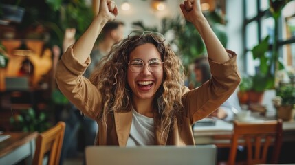 Wall Mural - Multiracial Business Team Celebrating Success Around Table with Laptop