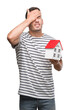 © Krakenimages.com - Handsome real estate agent holding a house stressed with hand on head, shocked with shame and surprise face, angry and frustrated. Fear and upset for mistake.