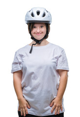 Sticker - Young adult cyclist woman with down syndrome wearing safety helmet over isolated background with a happy and cool smile on face. Lucky person.