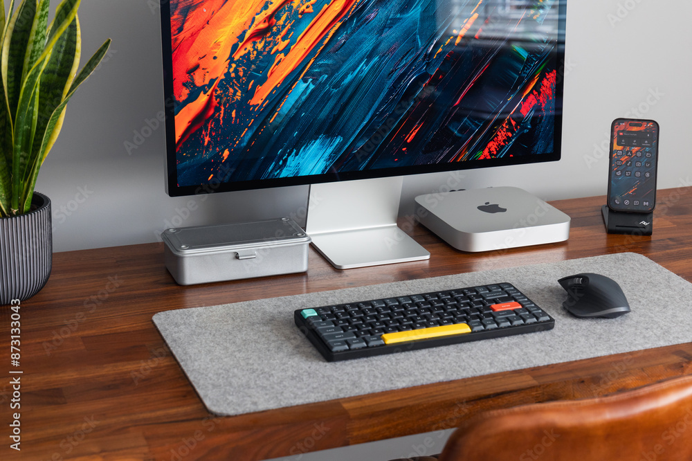 LONDON - JUNE 26, 2024: Apple Mac computer in modern home office, work ...